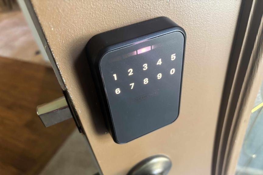Schlage's Sense Pro lock showing lit numbers on the outdoor panel.